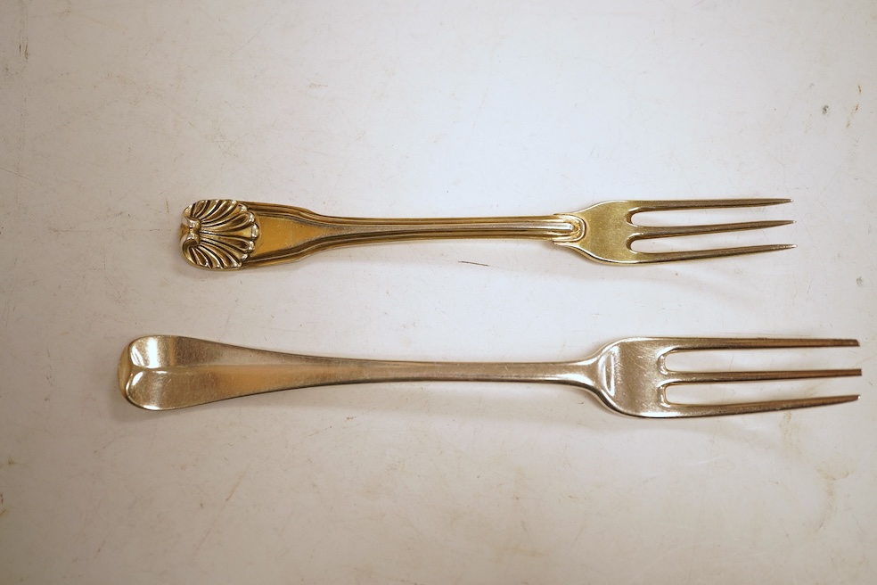 A collection of assorted mainly 18th century silver three pronged table forks, including a pair of dog nose, 19.1cm, most with indistinct or rubbed marks, together with a similar collection of thirteen silver three prong